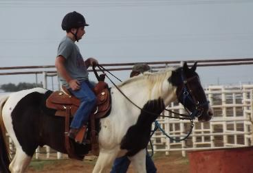 This rider was a buckle winner at the Roosevelt County Fair. He had regular lessons through out the year to prepare.