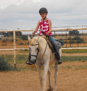 Morgan on Teefa sampling a horseback ride before trying a trail ride June 09